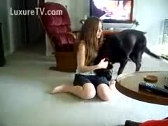 Barely legal cheating wife in a petite petticoat giving a kiss and playing with her dog